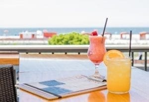 Image with tropical drinks on outside table